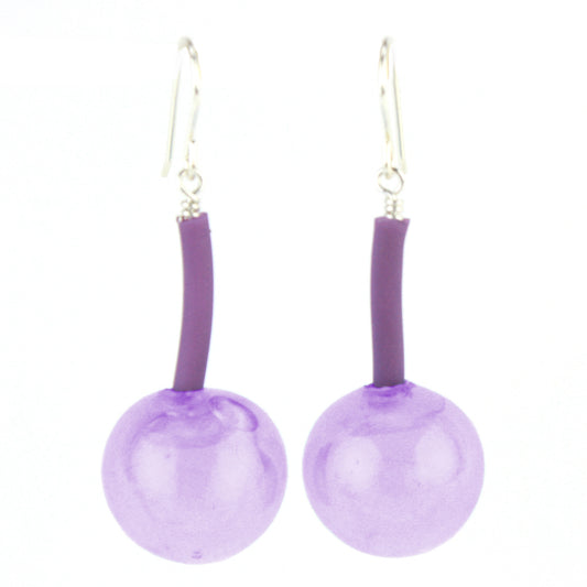 The Aura Earrings in Color-Changing Purple, featuring handcrafted glass beads that shift from purple to blue under fluorescent light, suspended from flexible tubing with sterling silver hooks.