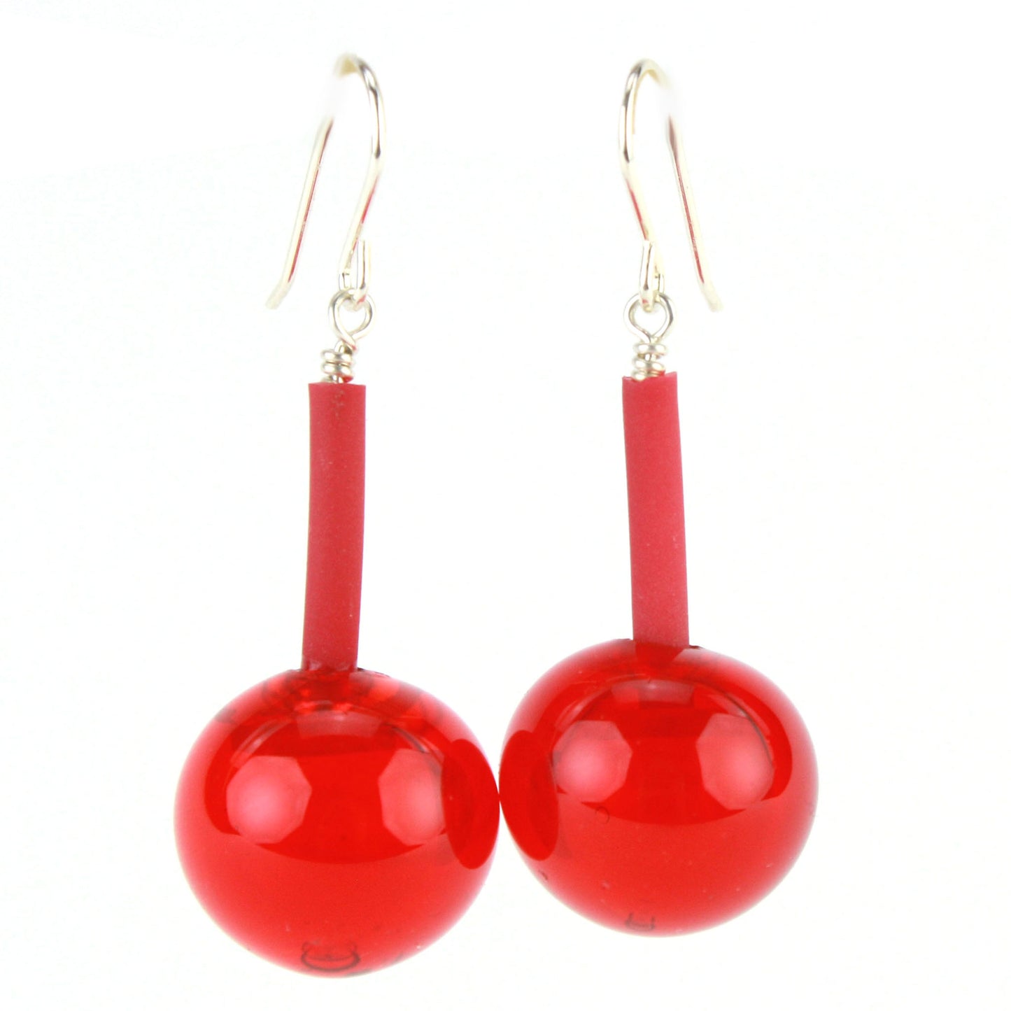 The Aura Earrings in Cherry Red, featuring handcrafted glossy glass beads suspended from flexible tubing with sterling silver hooks, designed for bold elegance and easy wear.