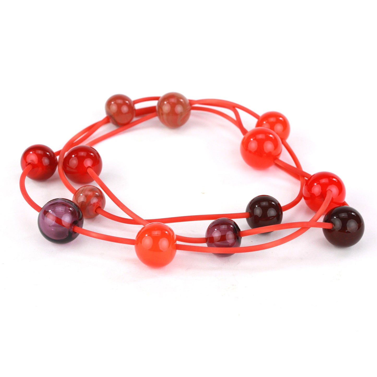 Orbit necklace in mixed shades of reds