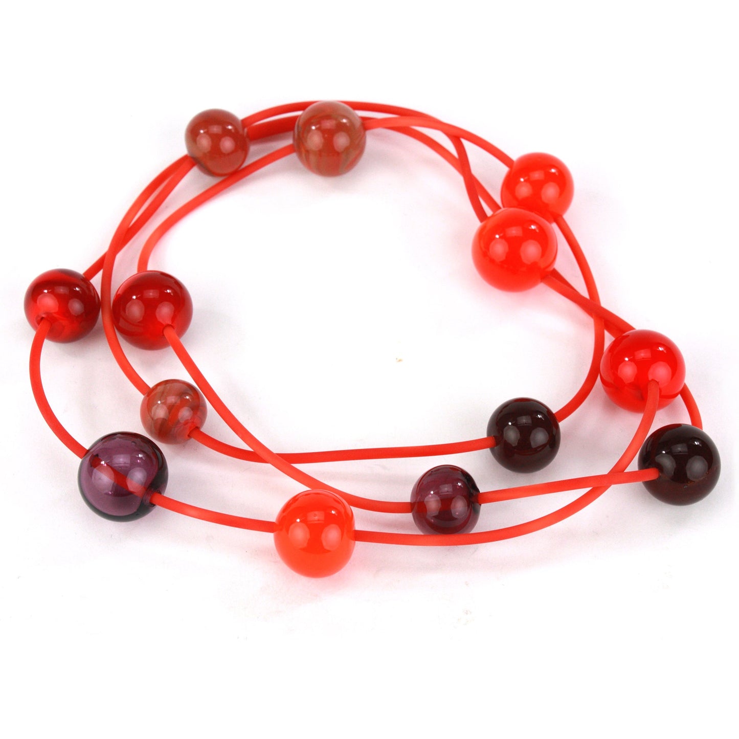 Orbit necklace in mixed shades of reds