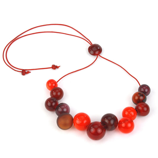 Bolla offset necklace -mixed shades of reds and oranges