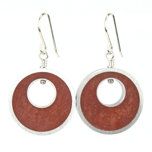 Copper Spotlight Earrings made of eco-resin and salvaged aluminum, featuring sterling silver ear wires and a lightweight design for sustainable style.
