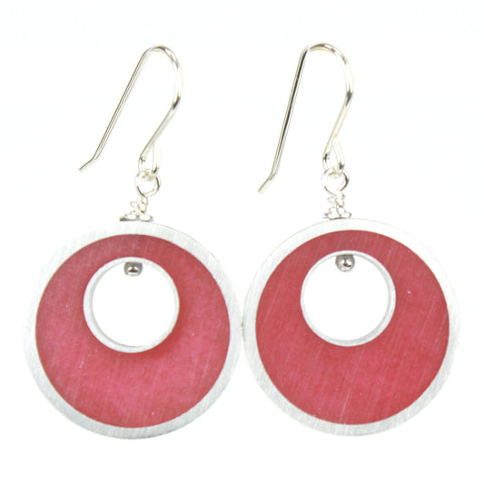 Bright pink Spotlight Earrings made of eco-resin and salvaged aluminum with sterling silver ear wires, offering lightweight and sustainable beauty.