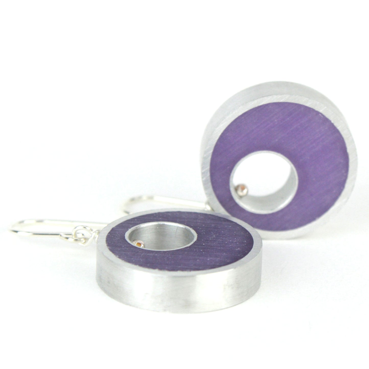 Purple Spotlight Earrings made of eco-resin and salvaged aluminum with sterling silver ear wires, offering lightweight and sustainable sophistication.