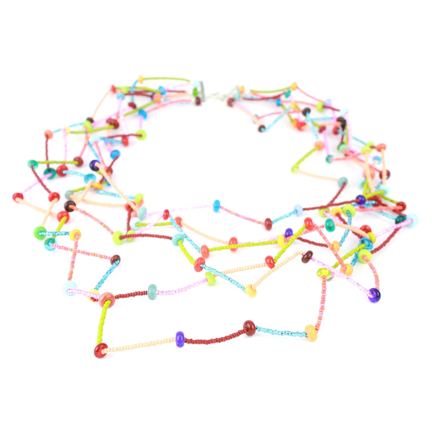 The Fiesta Necklace in multi color. Six-strand multicolor necklace with tiny glass and lampwork beads arranged in a crimped, zig-zag drape on steel cable.