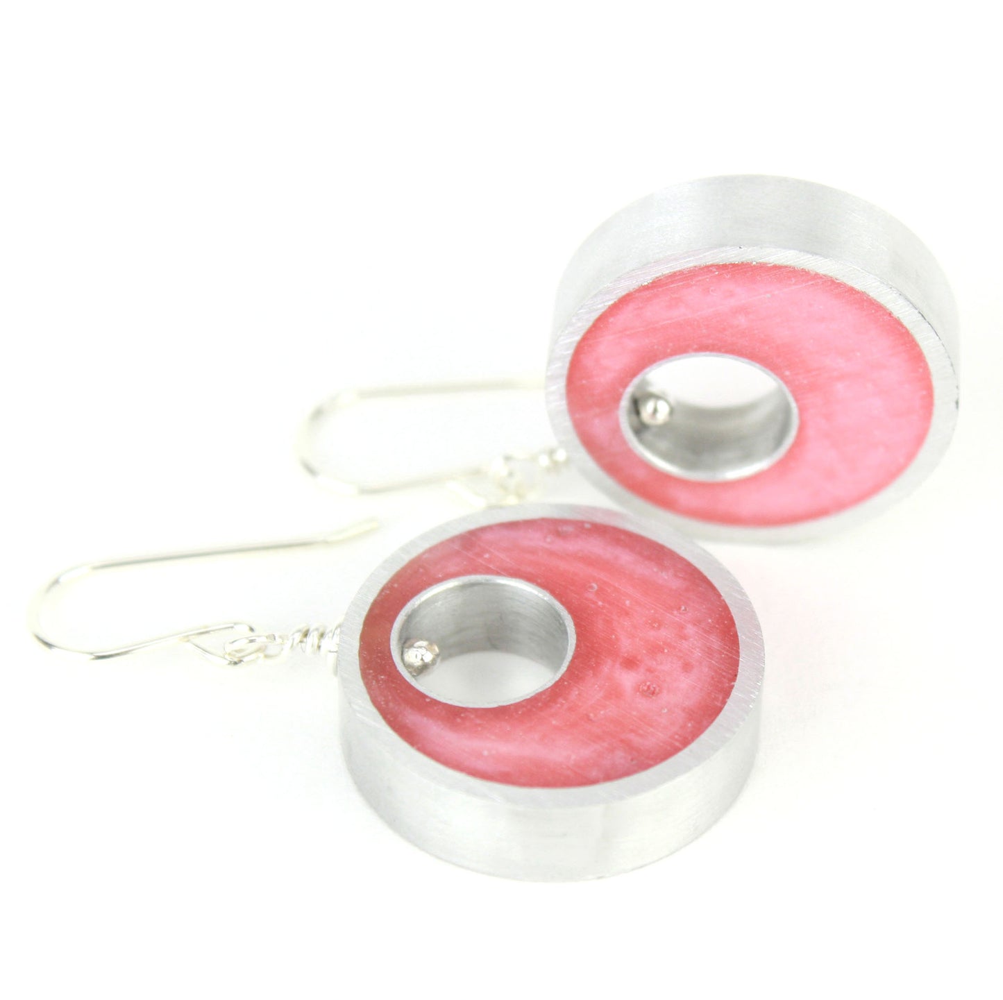 Light pink Spotlight Earrings made of eco-resin and salvaged aluminum with sterling silver ear wires, offering lightweight and sustainable charm.