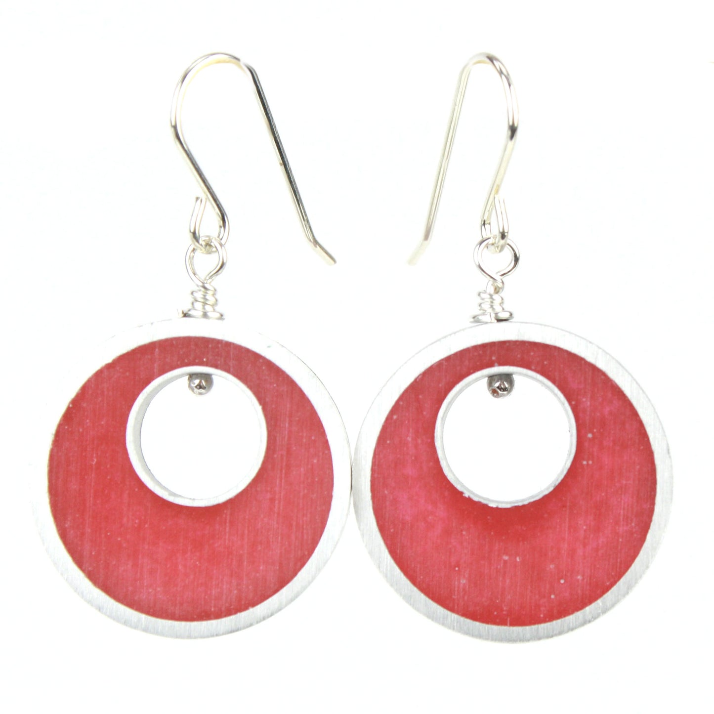 Red Spotlight Earrings made of eco-resin and salvaged aluminum with sterling silver ear wires, offering lightweight and sustainable elegance.