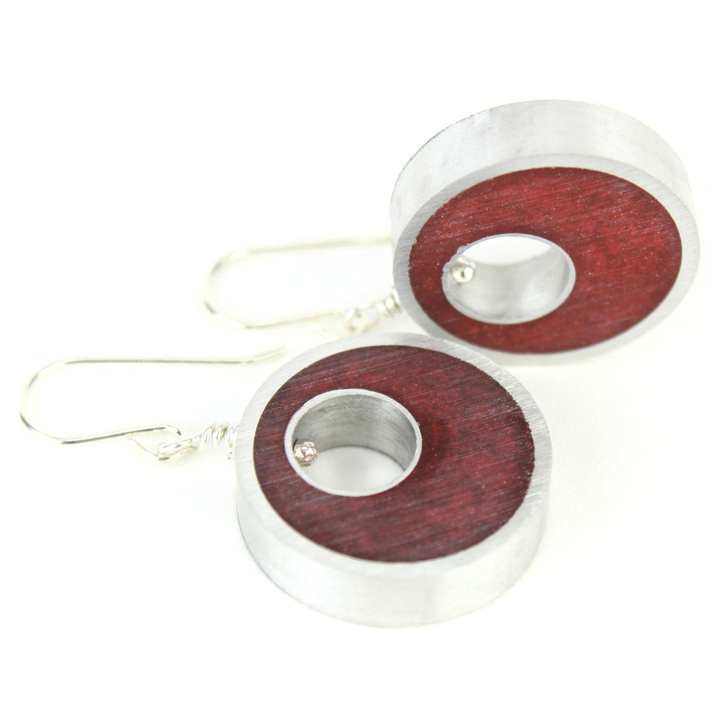 Ruby red Spotlight Earrings made of eco-resin and salvaged aluminum with sterling silver ear wires, offering lightweight and sustainable sophistication.