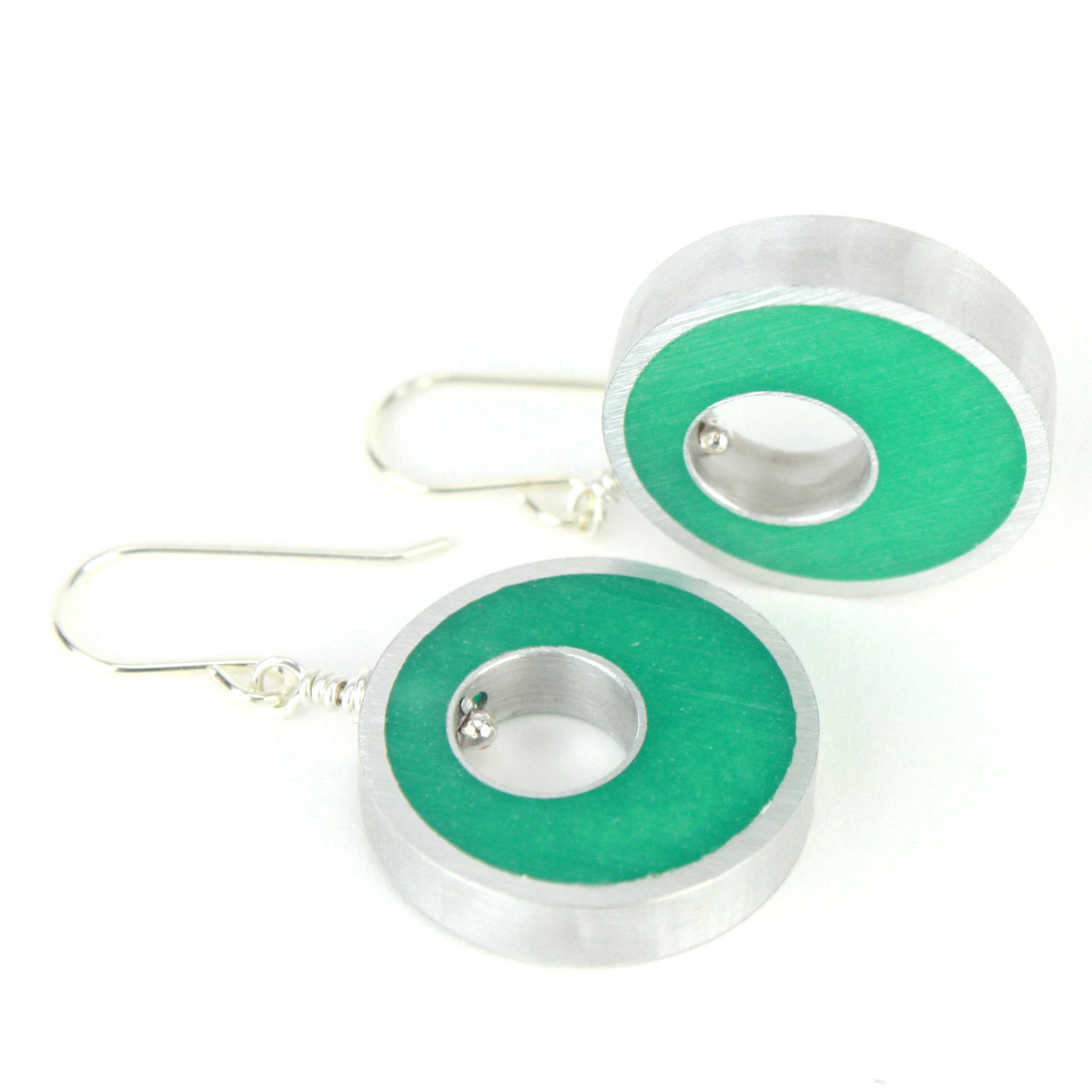 Seafoam Spotlight Earrings made of eco-resin and salvaged aluminum with sterling silver ear wires, offering lightweight and sustainable charm.