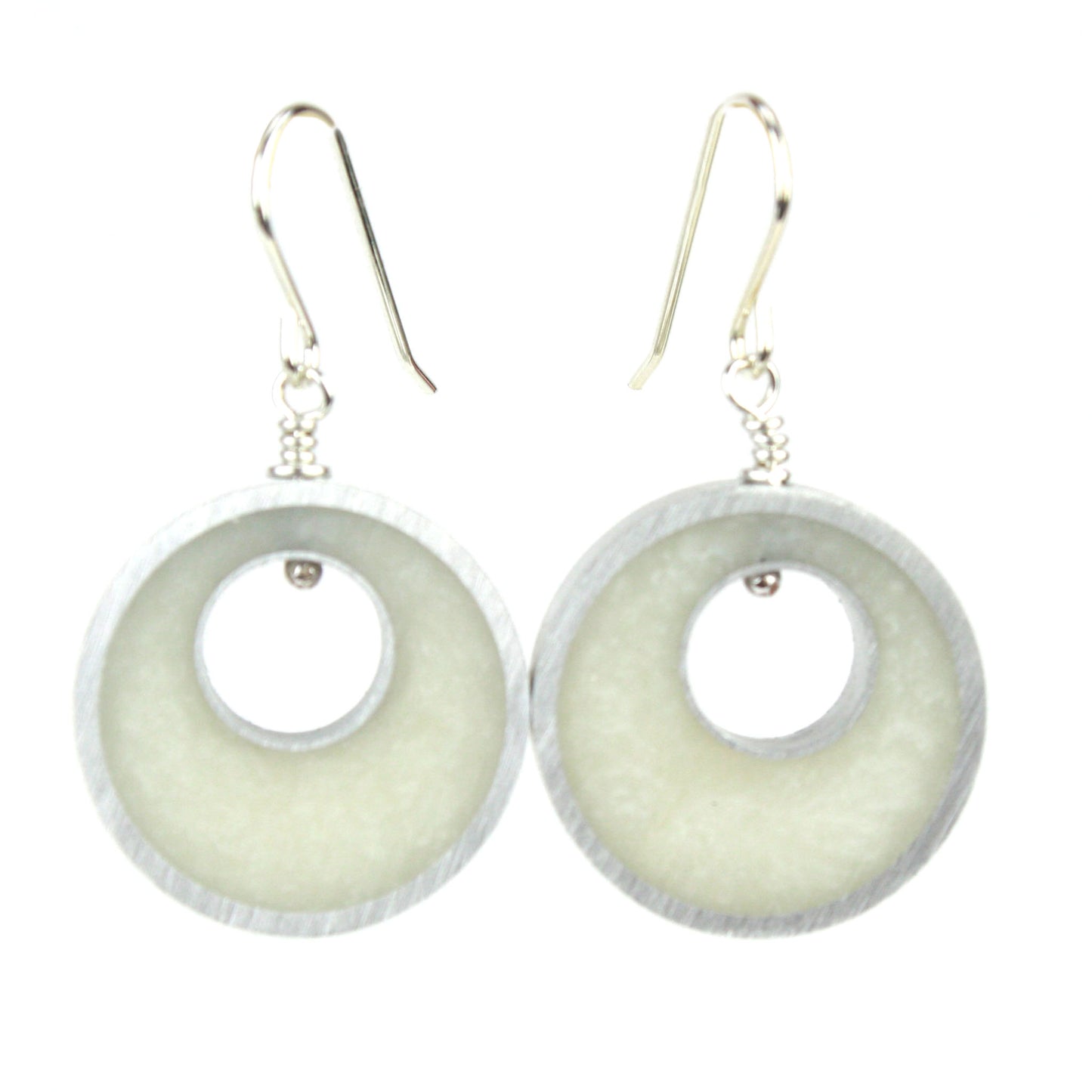 White Spotlight Earrings made of eco-resin and salvaged aluminum with sterling silver ear wires, offering lightweight and sustainable sophistication.